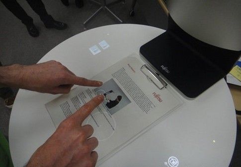 2014年,虚拟触控或实现报纸变成触摸屏