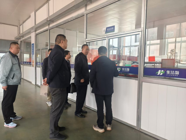 大连市政府参事室调研组走入辽宁集洁灏清洗消毒有限公司